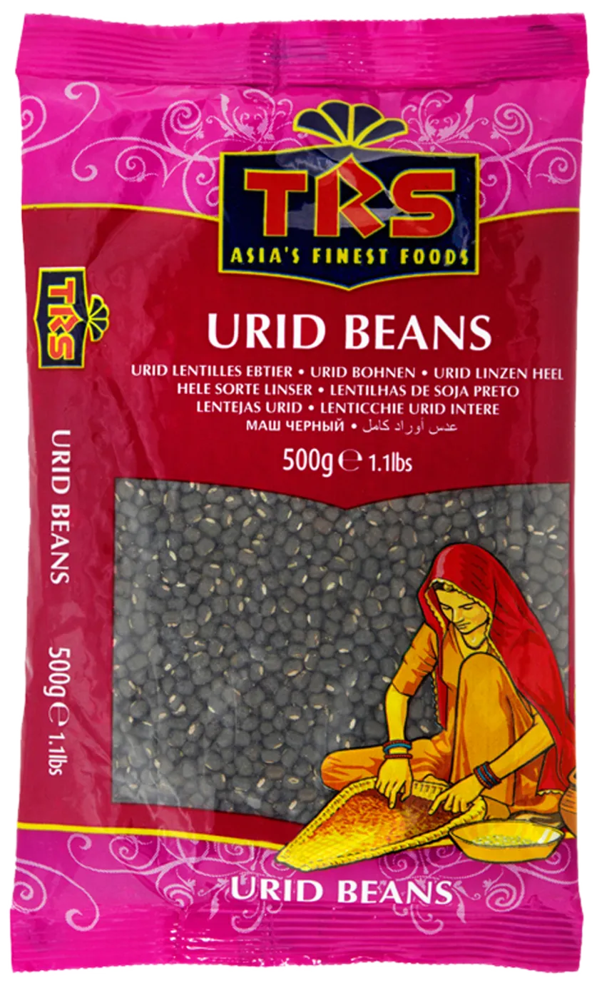 A bag of whole urad beans made by TRS